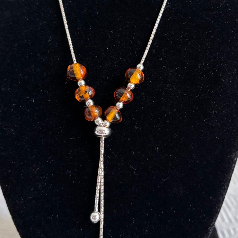 Elegant Silver and Orange Beaded Necklace